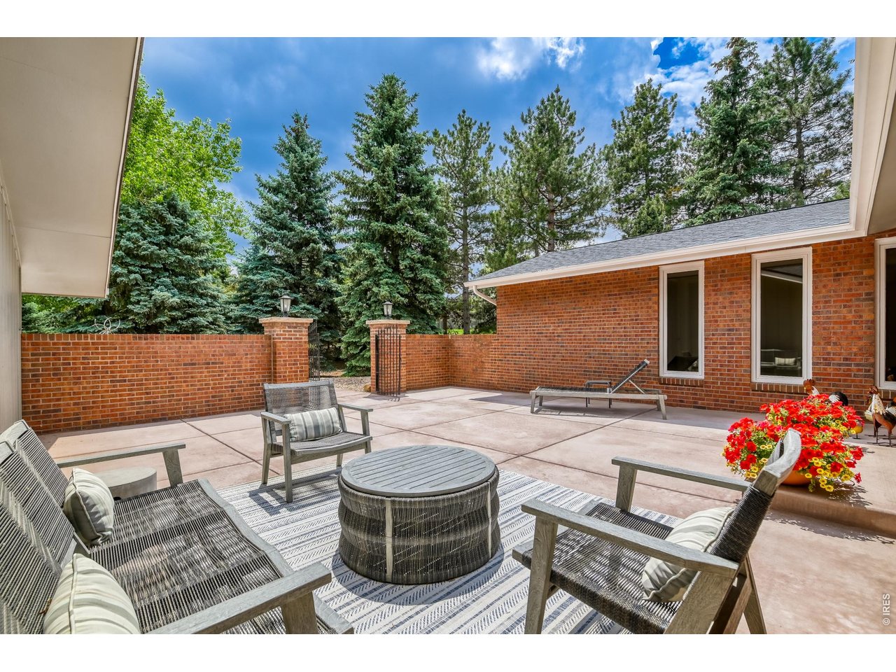 19 Ridge Road Boulder, CO 80303 - Photo 6 of 49 Large front patio to receive guests, facing east for morning coffee of evening cocktails.