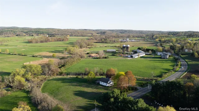 an aerial view of a golf course with outdoor space