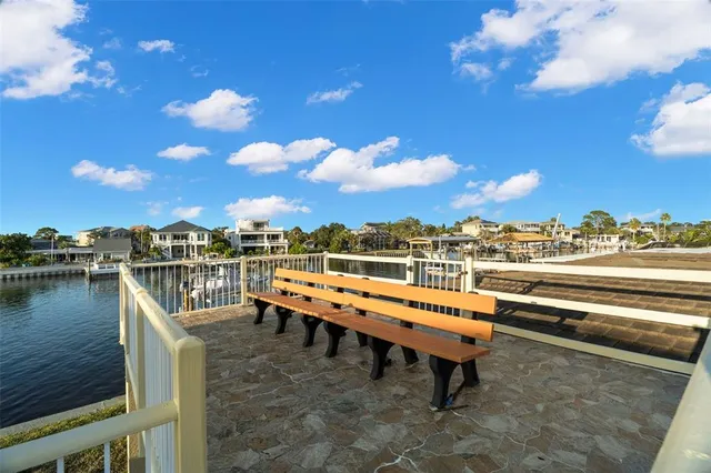 a aerial view of a chairs and table on the terrace