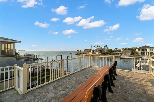 a front view of a house with a yard and a garage