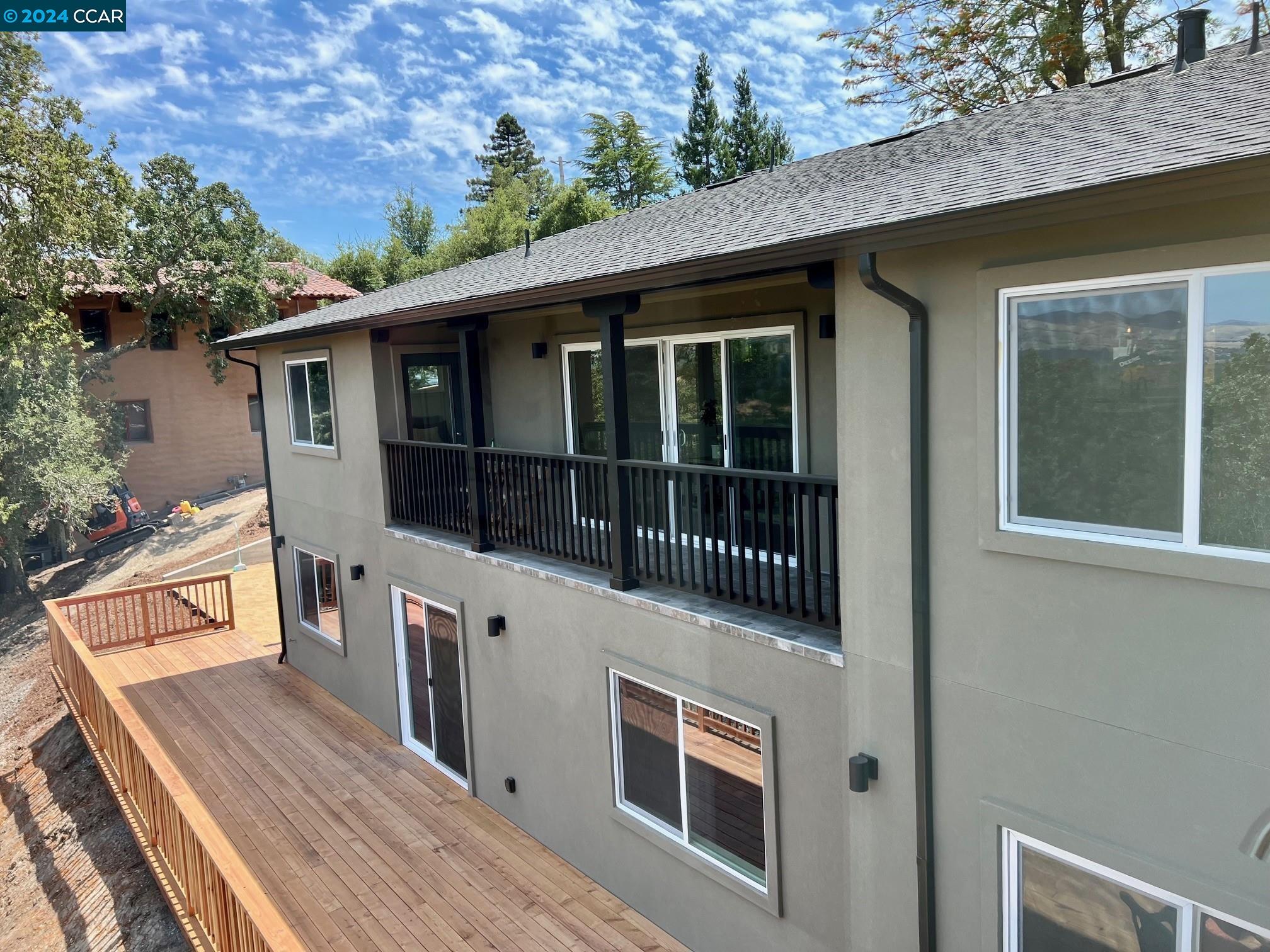 839 Las Trampas Road Lafayette, CA 94549 - Photo 1 of 1 a view of a house with a small yard and wooden floor and fence