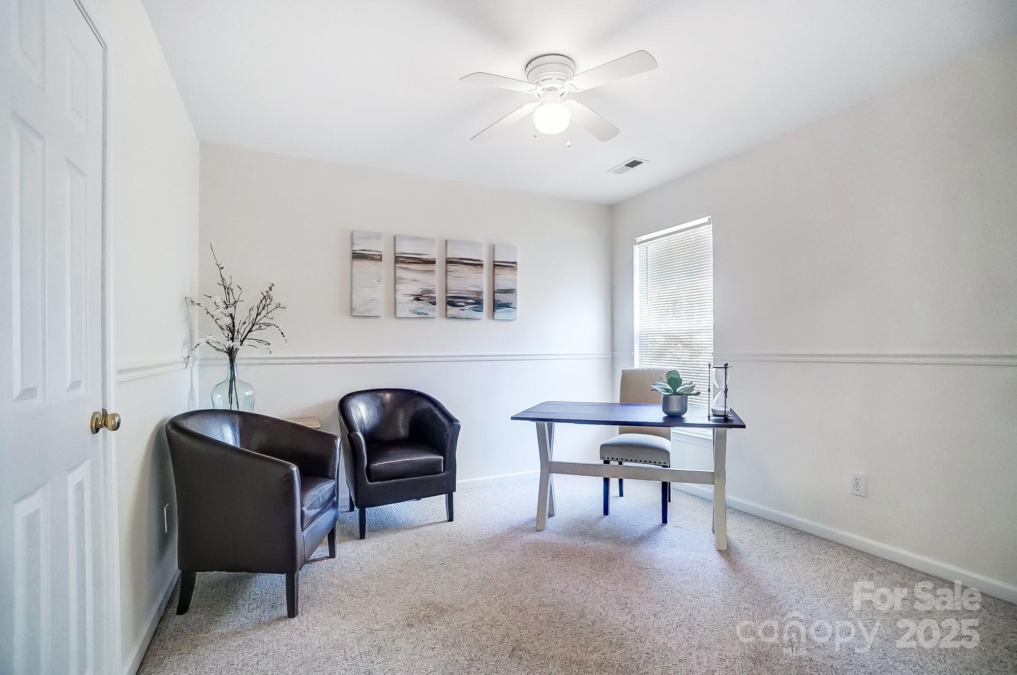 7647 Black Hawk Lane Tega Cay, SC 29708 - Photo 28 of 42 a work room with furniture and a piano
