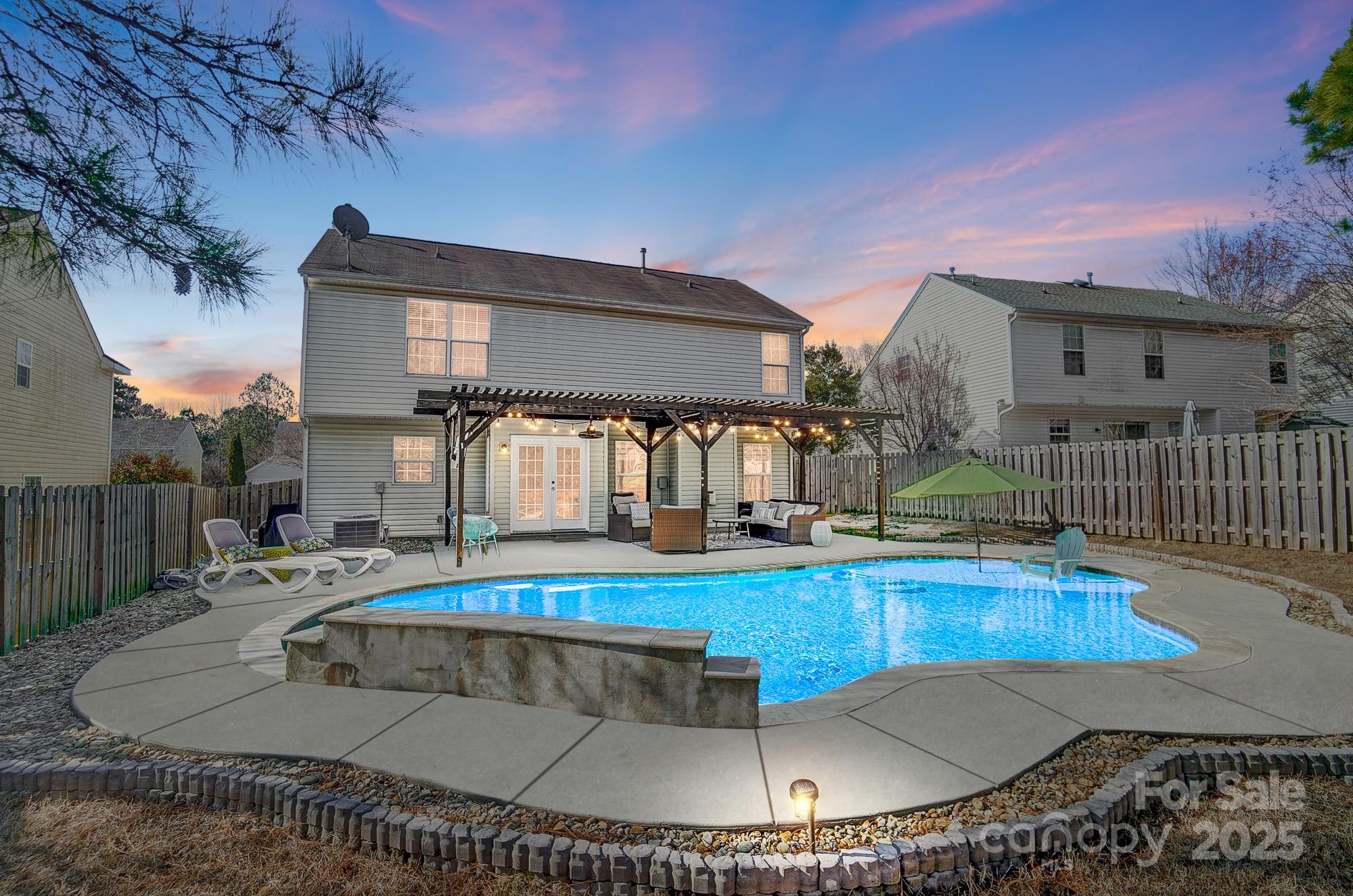 7647 Black Hawk Lane Tega Cay, SC 29708 - Photo 37 of 42 a view of a house with swimming pool