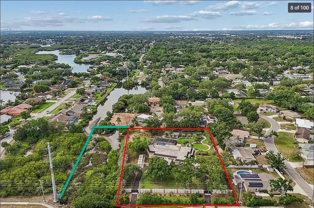 1875 Belleair Road Clearwater, FL 33764 - Photo 100 of 100 an aerial view of residential building with green space
