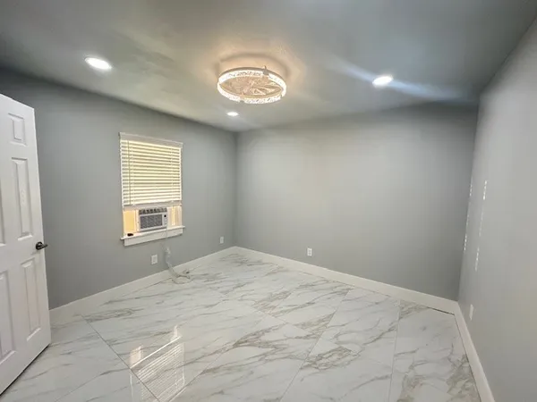 an empty room with windows