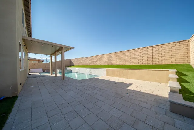 a view of an outdoor space and swimming pool