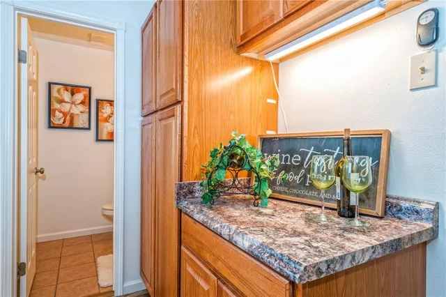 a bathroom with a toilet a sink and garden
