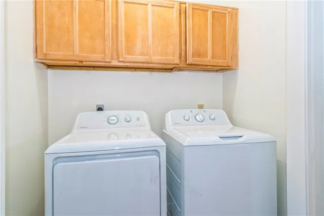 a aerial view of a house with a yard