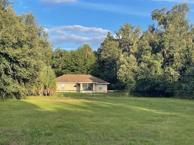 a house view with a outdoor space
