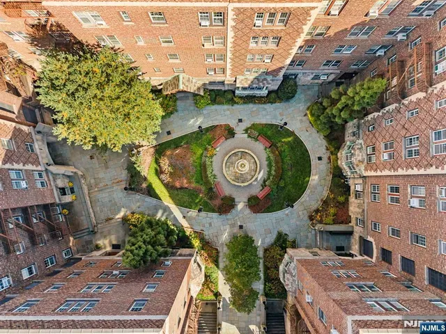a view of a car park in front of building