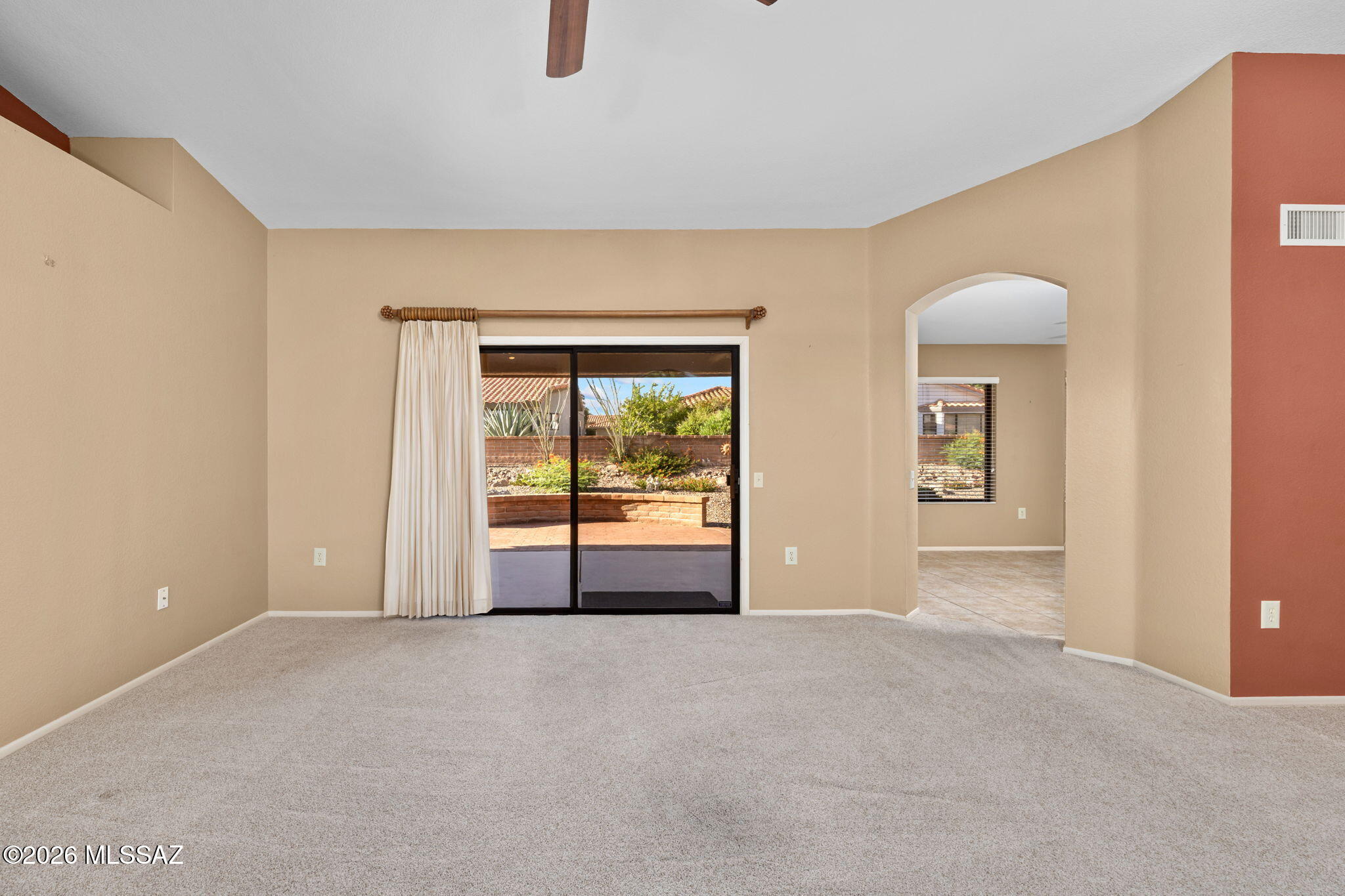 1029 East Rising Sun Drive Oro Valley, AZ 85755 - Photo 9 of 51 LIVING ROOM W/ SLIDER TO COVERED PATIO