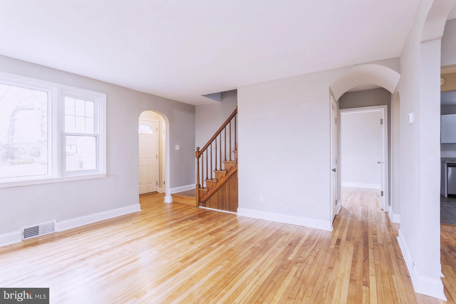 6509 Corkley Road Rosedale, MD 21237 - Photo 4 of 23 Living Room with Arched Doorways