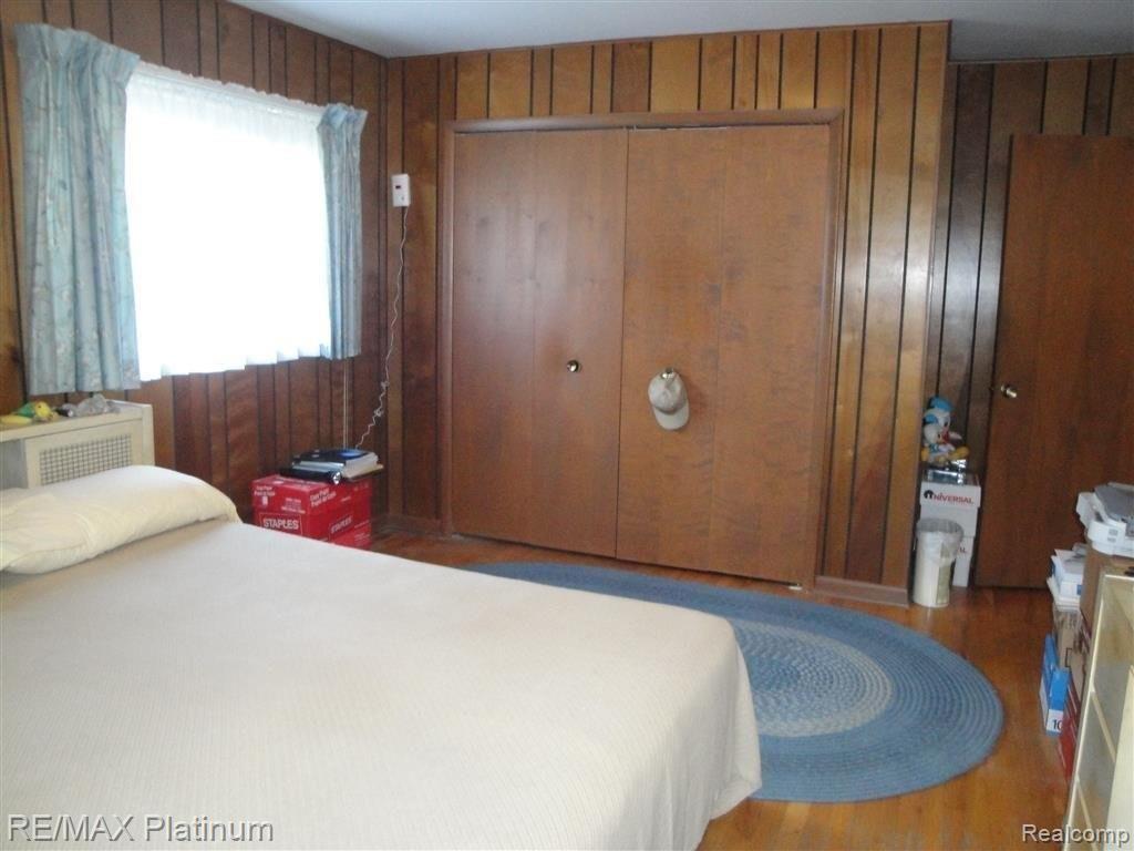 3901 North Burkhart Road Howell, MI 48855 - Photo 21 of 26 Hardwood in large Master Bedroom