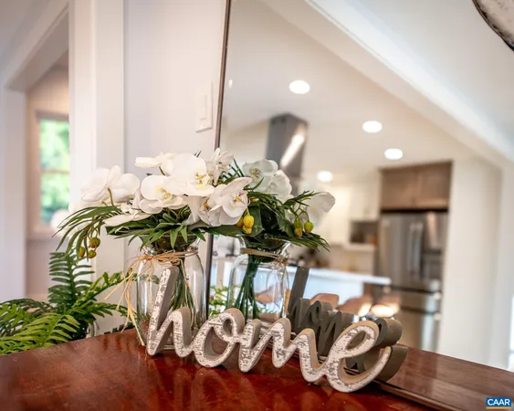 a vase of flowers sitting on a table