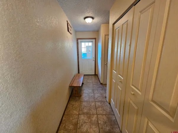 a view of a bathroom with sink and shower