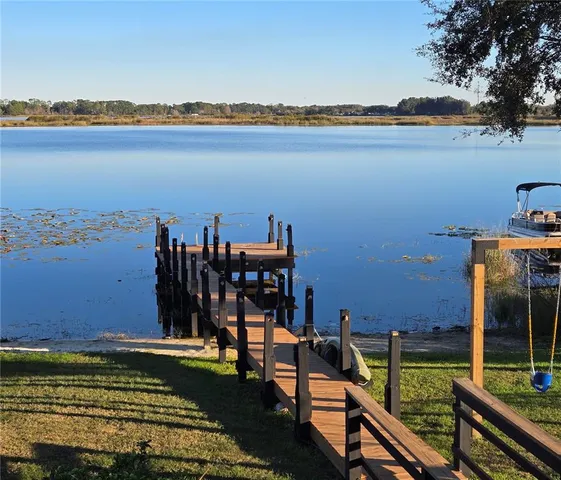 a view of a lake with a outdoor space