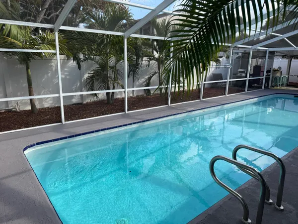a bathroom with a sink and a large window