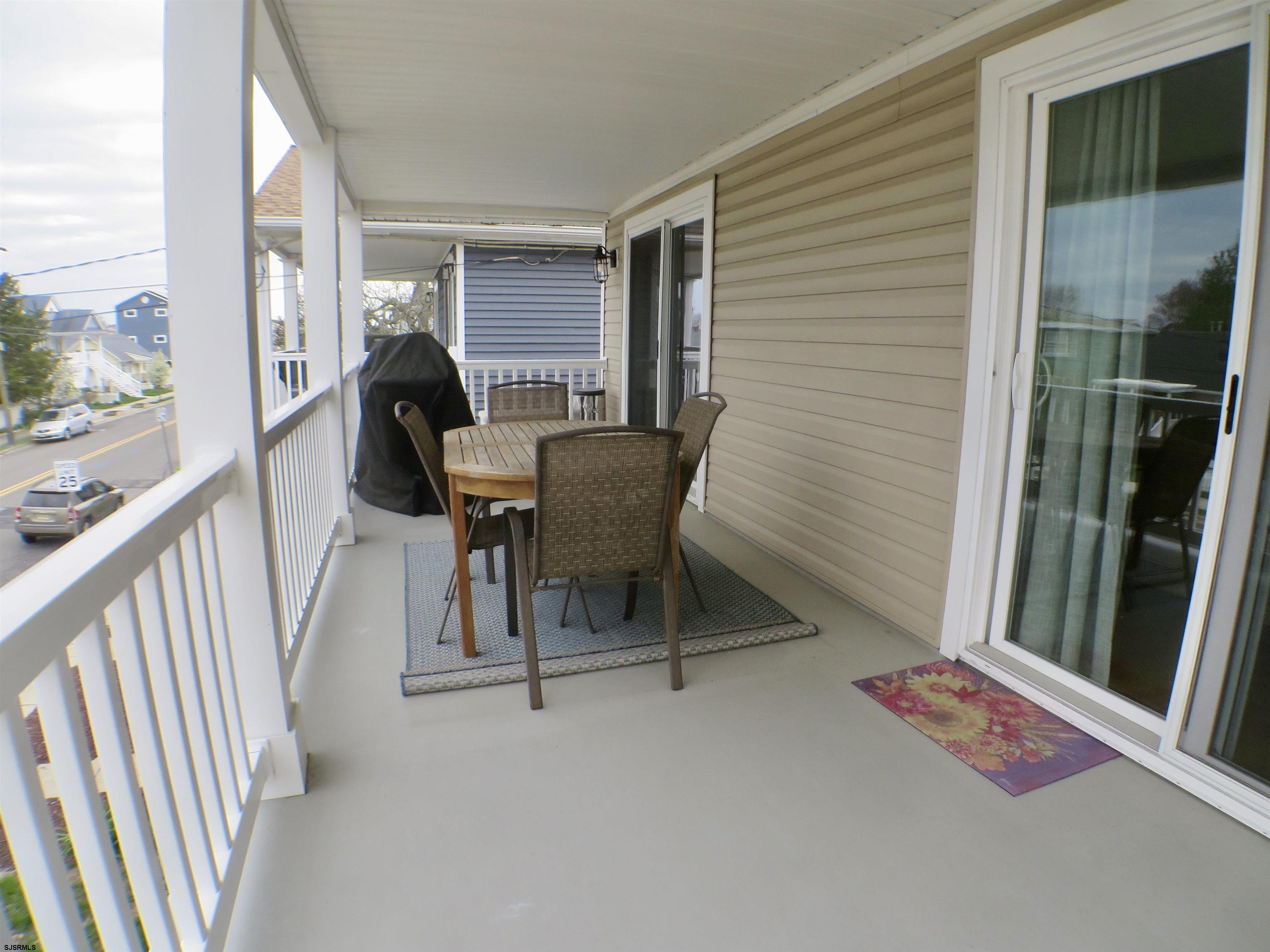 210 Simpson Avenue, Unit 2 Ocean City, NJ 08226 - Photo 12 of 20 a view of a two chair in the balcony