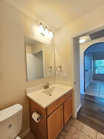 a view of livingroom with hardwood floor and a ceiling fan