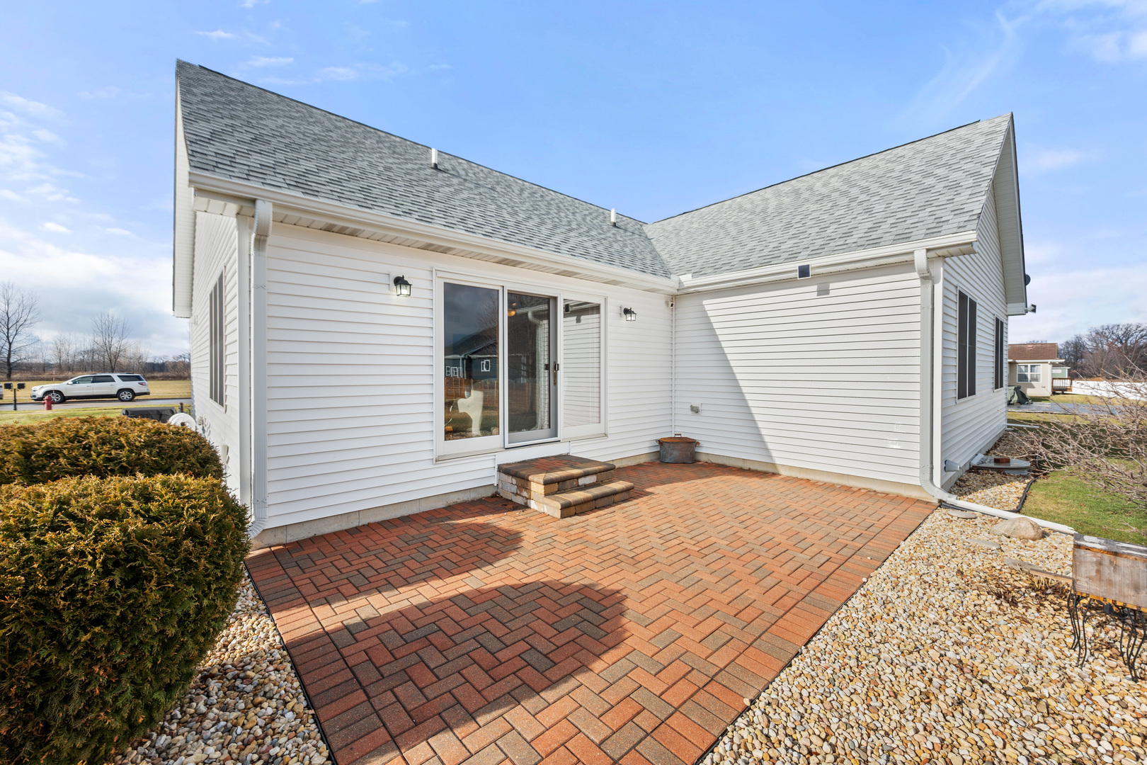 1012 Joshua Lane Genoa, IL 60135 - Photo 11 of 36 a backyard of a house with seating space