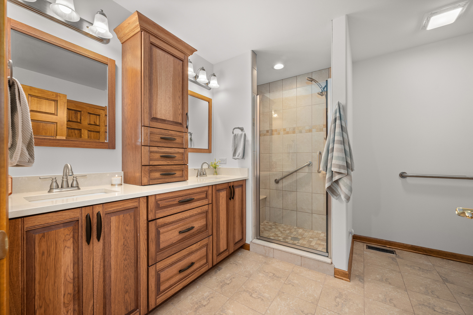 1012 Joshua Lane Genoa, IL 60135 - Photo 26 of 36 a bathroom with a granite countertop sink mirror and double