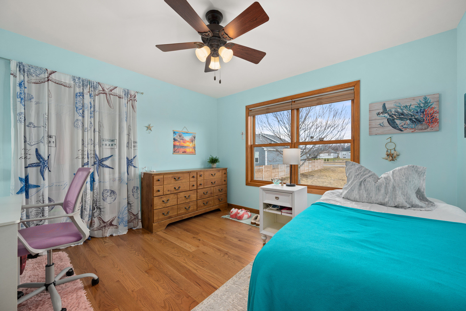 1012 Joshua Lane Genoa, IL 60135 - Photo 29 of 36 a living room with furniture and a window