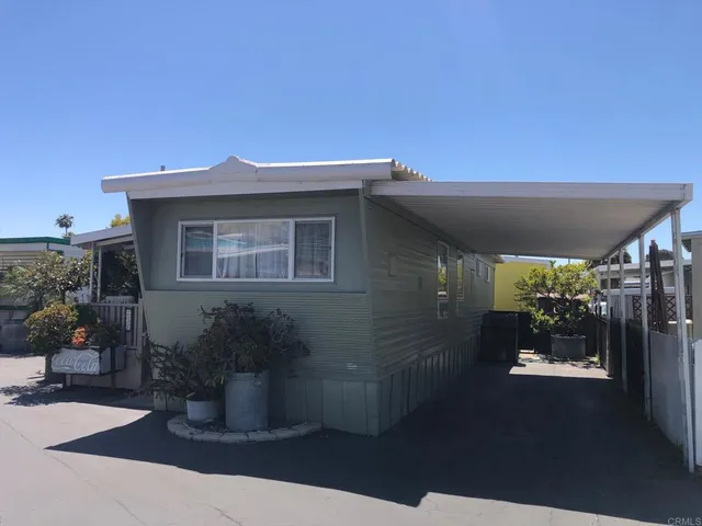 a view of a house with patio