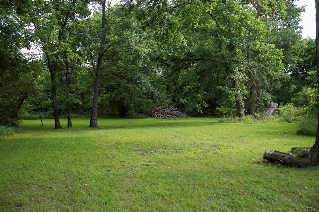 1500 Bonham Street Commerce, TX 75428 - Photo 28 of 29 a view of field with tall trees