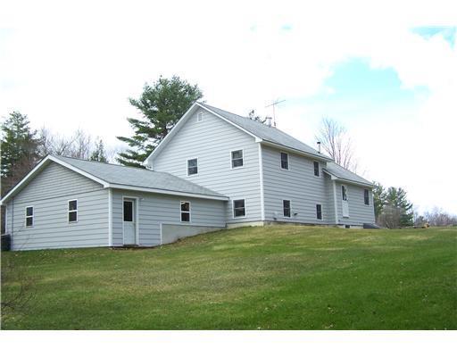 54 Poors Mill Road Morrill, ME 04952 - Photo 2 of 15 Exterior Back. Back of home with big...