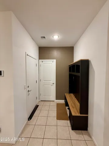 a view of a elevator and an empty room