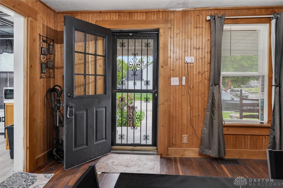 1726 Morgan Street Springfield, OH 45503 - Photo 7 of 30 Step into this welcoming space featuring natural wood paneling and abundant light.