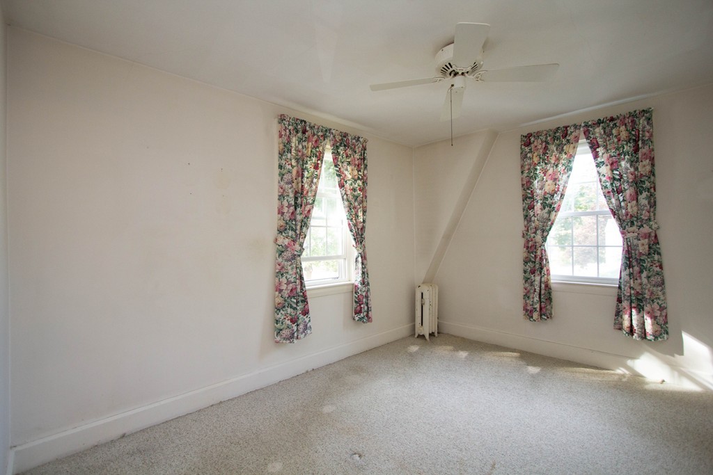 2 Summer Hill Road Maynard, MA 01754 - Photo 18 of 23 an empty room with windows and entrance