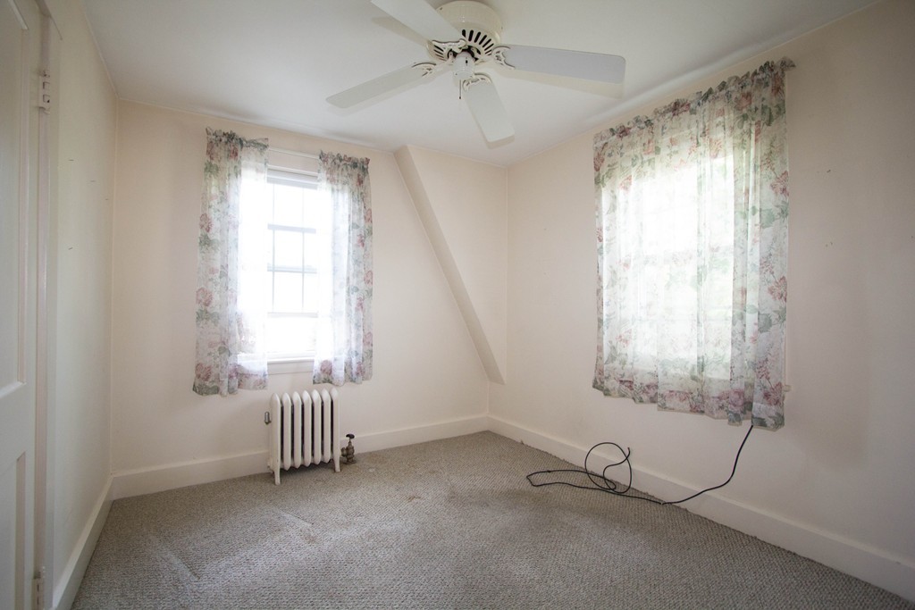 2 Summer Hill Road Maynard, MA 01754 - Photo 19 of 23 a view of an empty room with a window