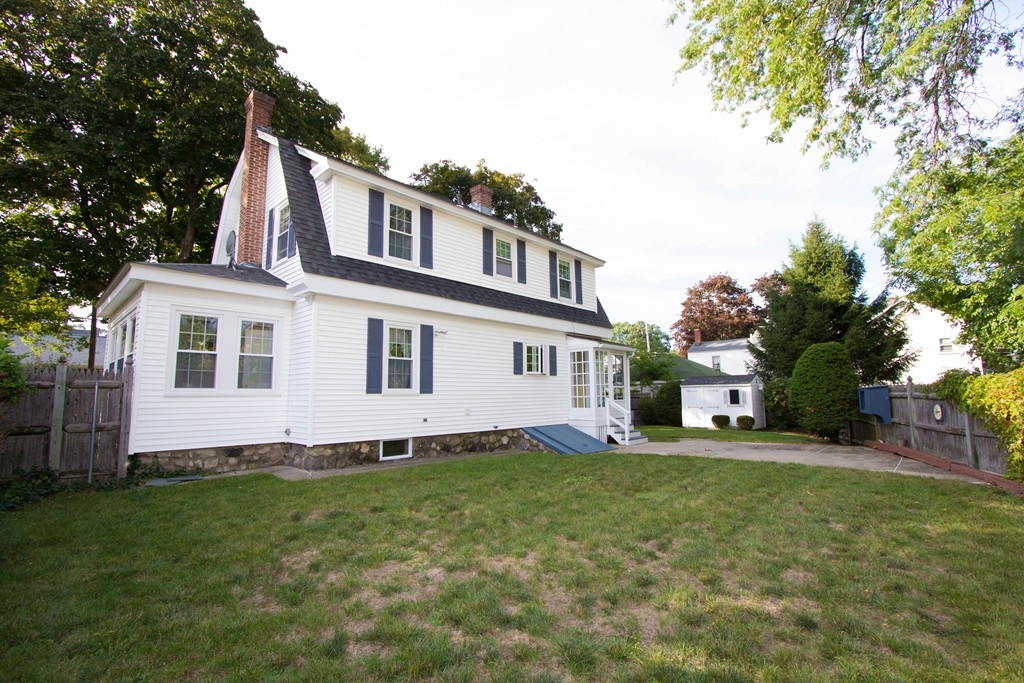 2 Summer Hill Road Maynard, MA 01754 - Photo 23 of 23 a view of a house with a yard and sitting area