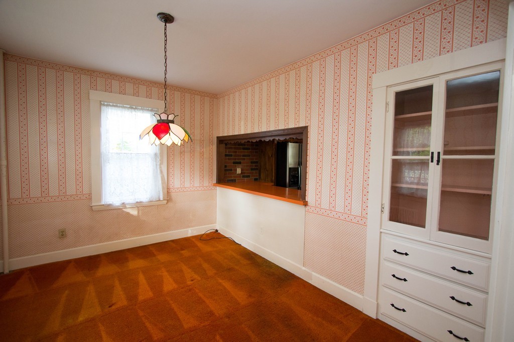 2 Summer Hill Road Maynard, MA 01754 - Photo 4 of 23 a very nice looking room with a cabinet and a window