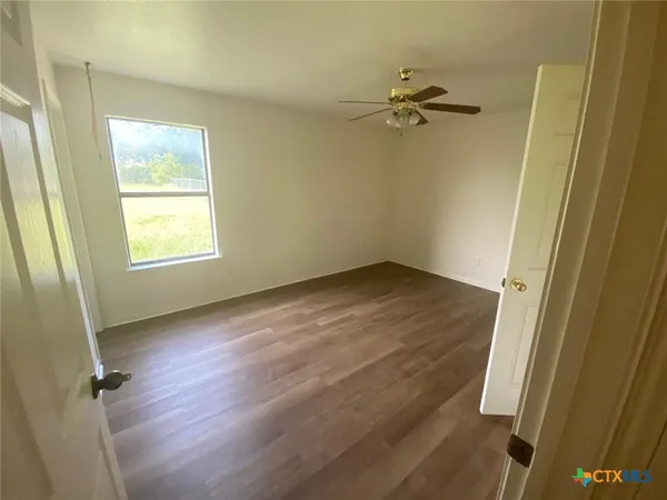 an empty room with windows