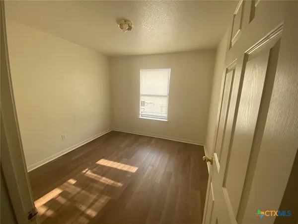 a view of empty room with window