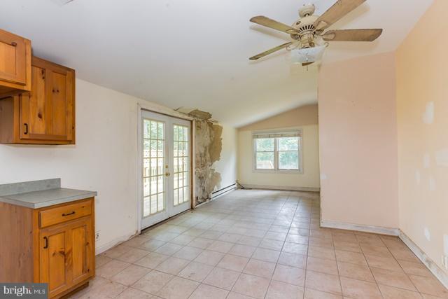 5865 Solomons Island Road Tracys Landing, MD 20779 - Photo 2 of 29 a view of an empty room with a window