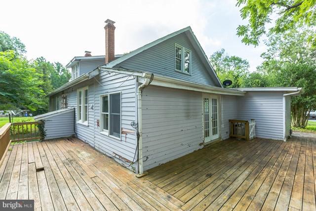 5865 Solomons Island Road Tracys Landing, MD 20779 - Photo 21 of 29 a view of a house with a yard