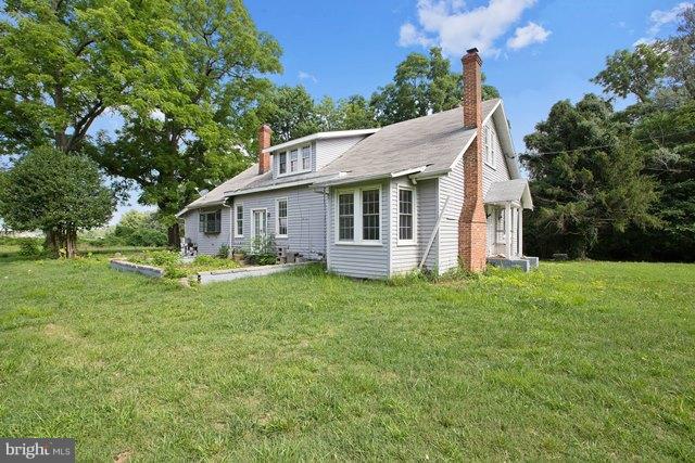 5865 Solomons Island Road Tracys Landing, MD 20779 - Photo 23 of 29 a view of a house with backyard and garden