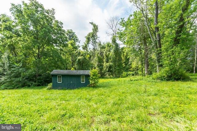 5865 Solomons Island Road Tracys Landing, MD 20779 - Photo 27 of 29 a view of a house with a yard