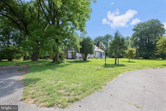 5865 Solomons Island Road Tracys Landing, MD 20779 - Photo 28 of 29 a view of a park with large trees
