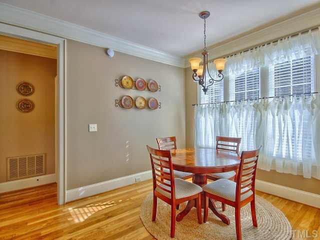9705 Bailey Grove Court Raleigh, NC 27613 - Photo 10 of 25 Breakfast room overlooks huge fenced yard.