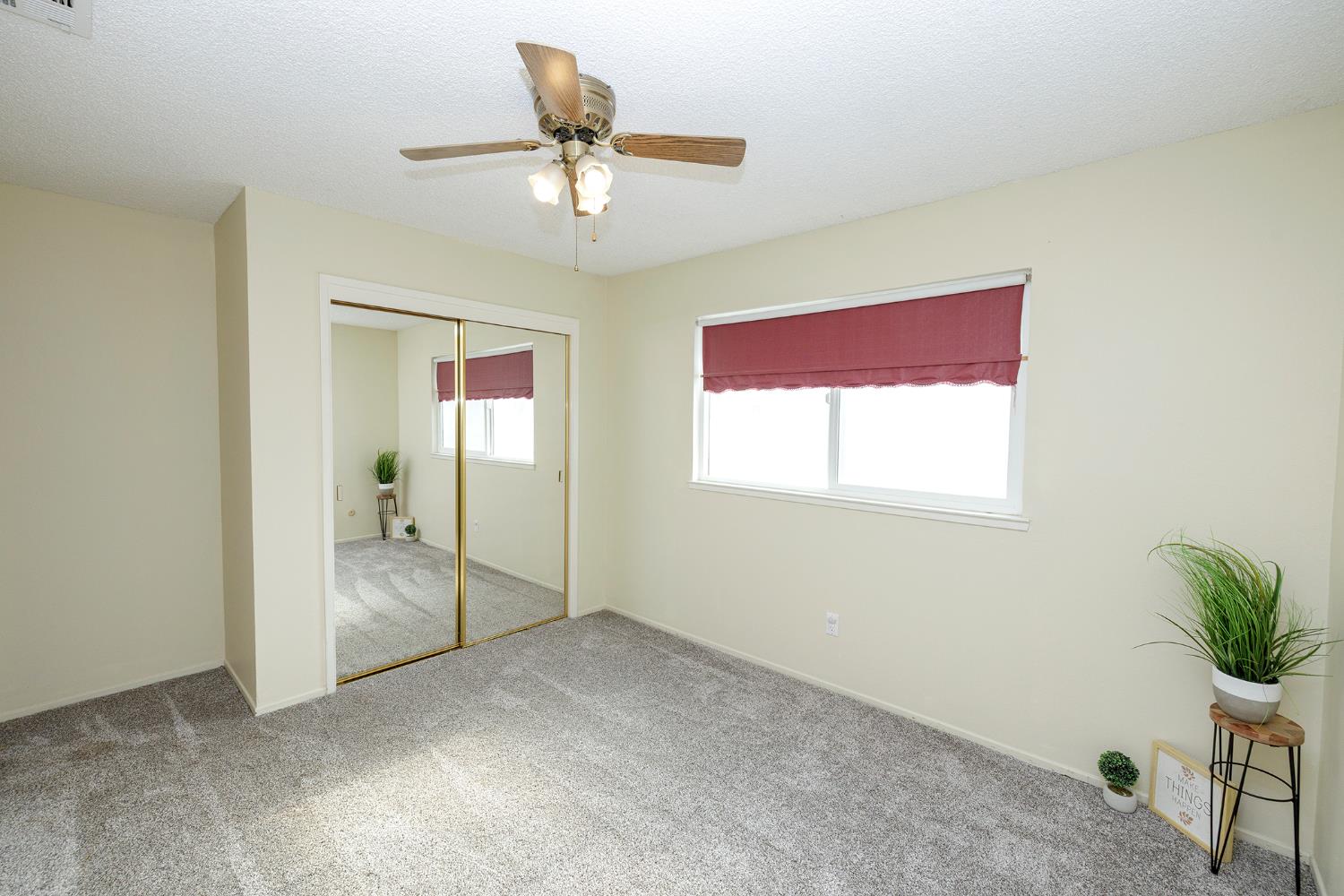495 Valdapena Way Escalon, CA 95320 - Photo 21 of 38 a view of an empty room with a window