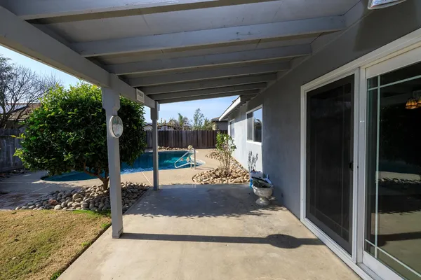 a view of a porch with furniture
