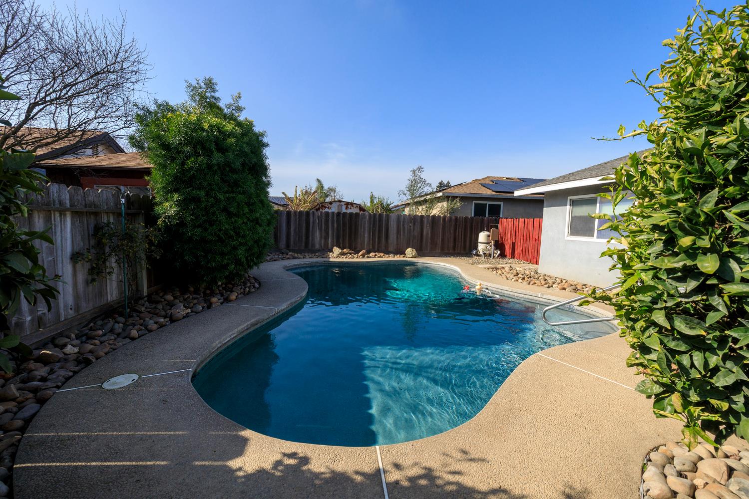495 Valdapena Way Escalon, CA 95320 - Photo 34 of 38 a view of a swimming pool with a patio