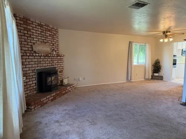 a view of a livingroom with a fireplace