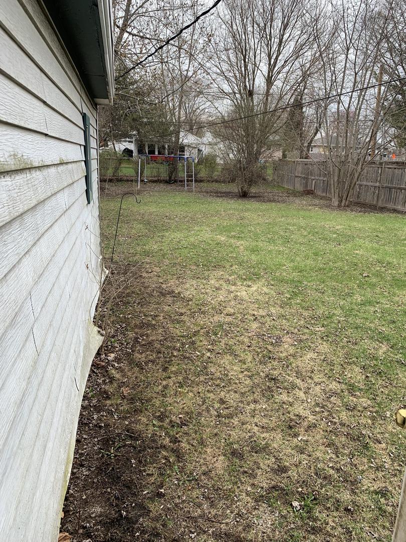 2107 Flicker Lane Rolling Meadows, IL 60008 - Photo 11 of 13 a view of a yard with trees