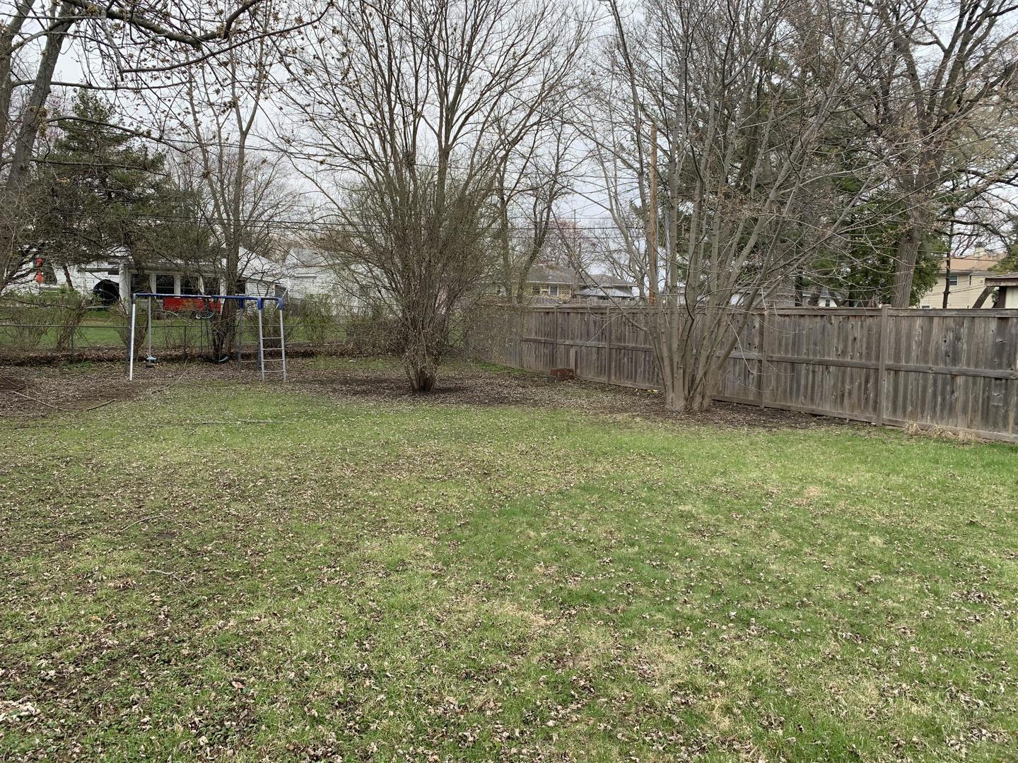 2107 Flicker Lane Rolling Meadows, IL 60008 - Photo 12 of 13 a view of a yard with a tree