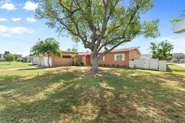a house view with a garden space